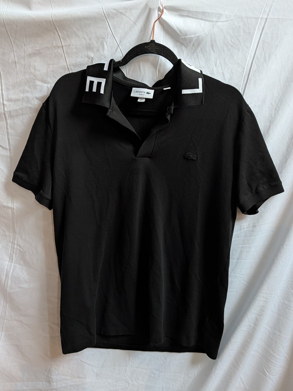Lacoste Black Polo with White Collar Lettering